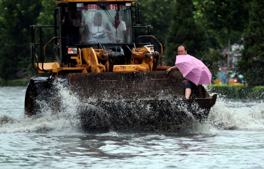 Hujan lebat kembali menambah parah banjir di China