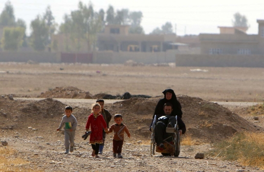 Perjuangan wanita bawa suami lumpuh dan empat anak kabur dari ISIS