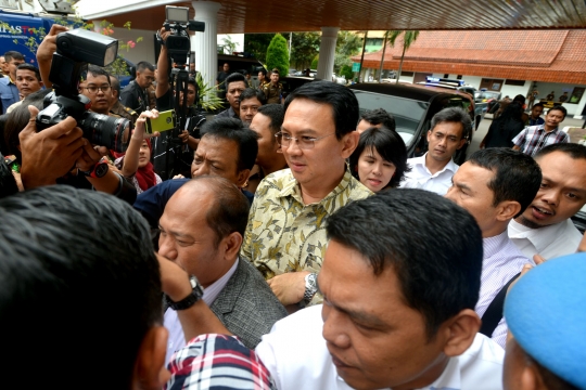 Ekspresi Ahok saat tiba di Kejaksaan Agung