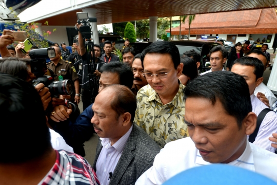 Ekspresi Ahok saat tiba di Kejaksaan Agung