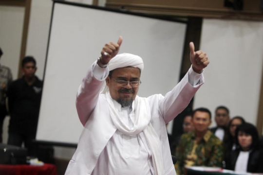 Ekspresi Ahok saat mendengar kesaksian Rizieq Syihab