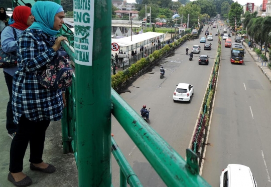 Menikmati kelengangan lalu lintas di kota seribu angkot