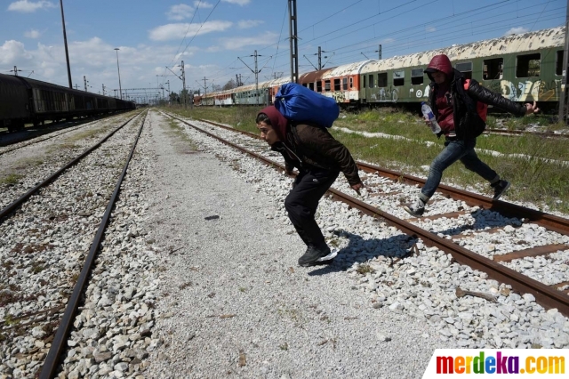 Foto : Kesengsaraan imigran bertahan hidup di gerbong 