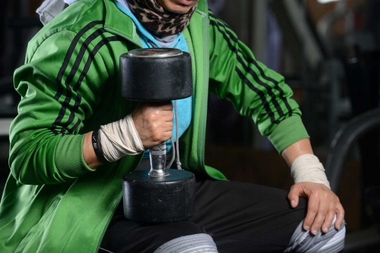 Fathia Al-Amamy, satu-satunya atlet binaraga berhijab di dunia