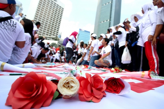 Aksi Sejuta Bunga untuk Anies-Sandi di Car Free Day