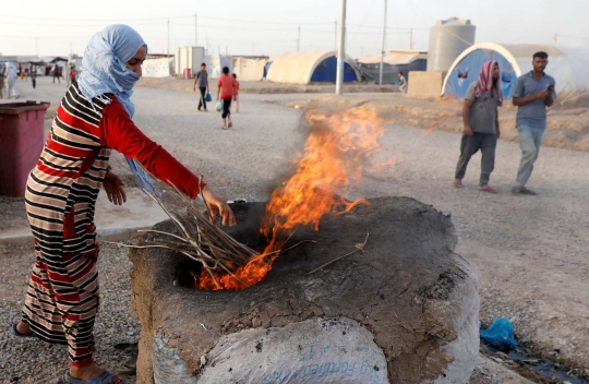 Kesederhanaan korban ISIS buka puasa di pengungsian