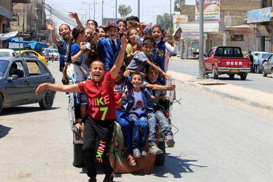 Potret anak-anak Mosul rayakan Idul fitri di taman bermain