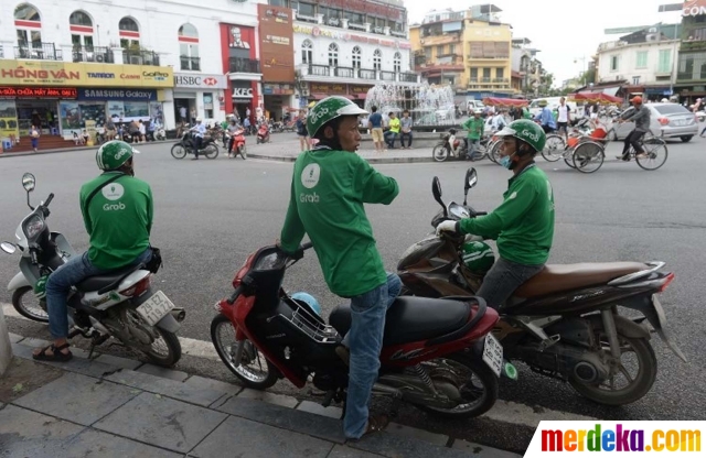 Foto Santainya perlengkapan driver GrabBike  di Vietnam 