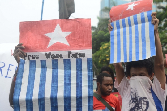 Sebelum ditangkap, massa aktivis Papua arak bendera OPM ke Istana
