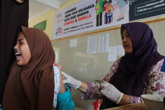 Ekspresi 400 anak pesantren saat divaksinasi campak dan rubella