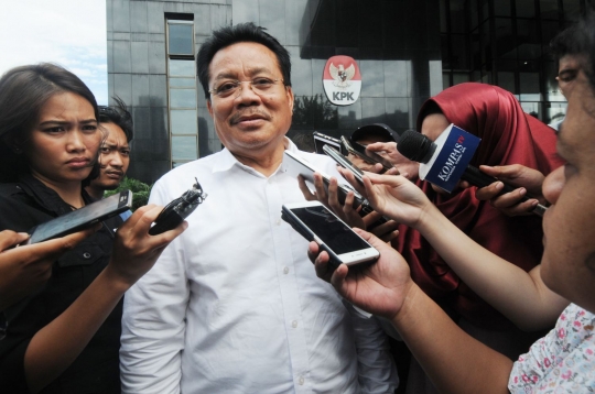 Ekspresi mantan anggota DPR RI Numan Abdul Hakim usai diperiksa kasus e-KTP