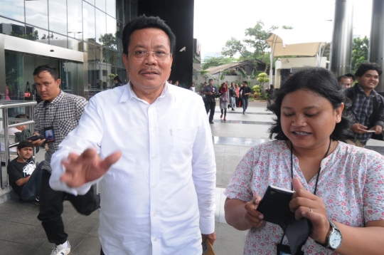 Ekspresi mantan anggota DPR RI Numan Abdul Hakim usai diperiksa kasus e-KTP