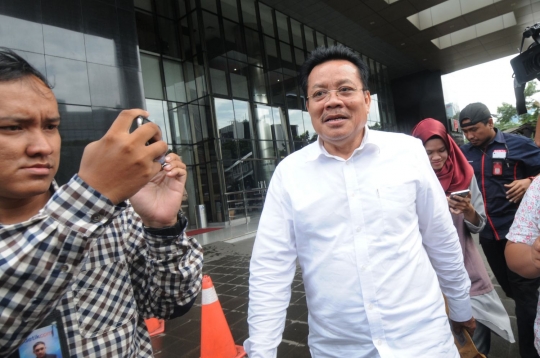 Ekspresi mantan anggota DPR RI Numan Abdul Hakim usai diperiksa kasus e-KTP