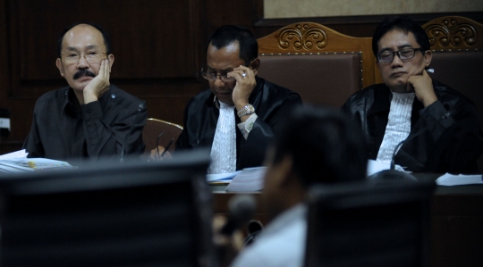 Ekspresi Fredrich saat jalani sidang lanjutan