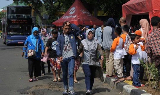 Serunya berkeliling Jakarta naik bus tingkat City Tour