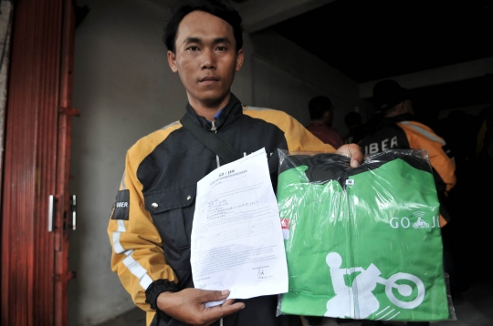 Diakuisisi Grab, ratusan mantan Uber berbondong daftar jadi mitra Go-Jek