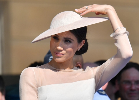 Gaya Meghan Markle tampil perdana usai menikah dengan Pangeran Harry