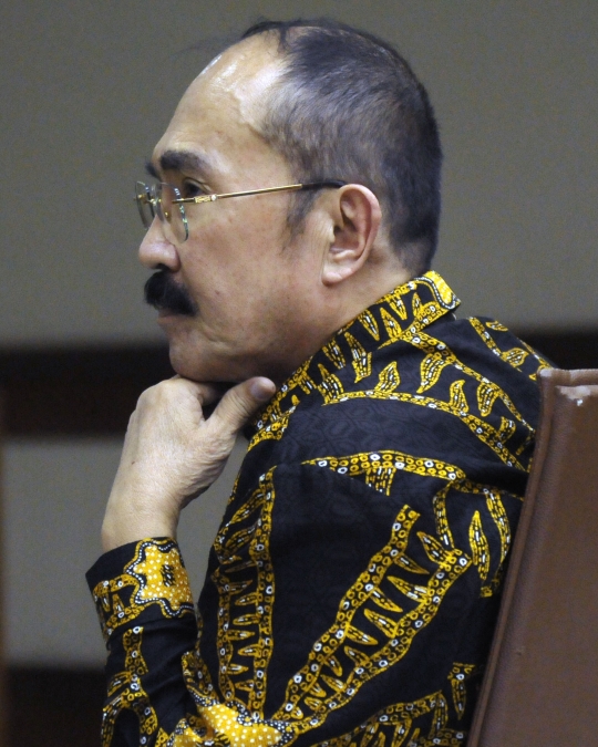 Ekspresi Fredrich Yunadi saat jalani sidang pemeriksaan terdakwa