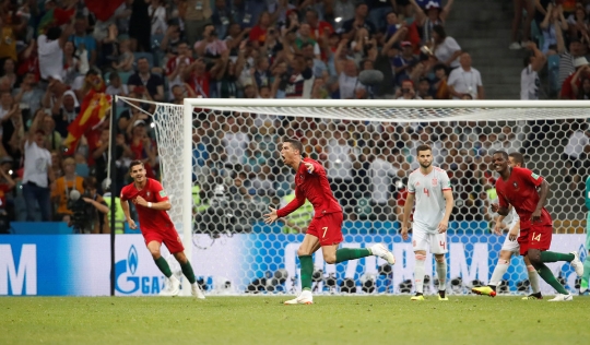 Saling serang, Portugal berbagi angka dengan Spanyol