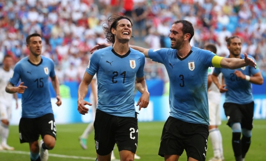Hajar Rusia 3-0, Suarez, Laxalt dan Cavani antar Uruguay jadi juara grup