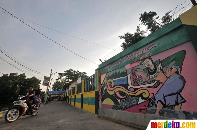 Foto : Warna-warni mural Betawi di Kampung Pitung merdeka.com