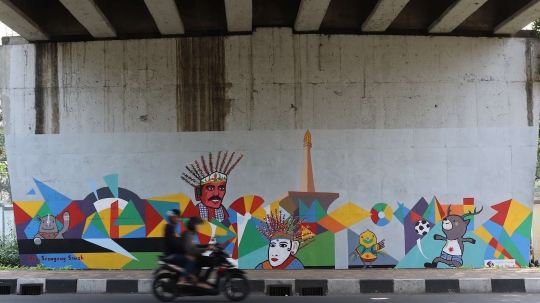 Pasukan oranye hiasi kolong flyover UI dengan mural Asian Games