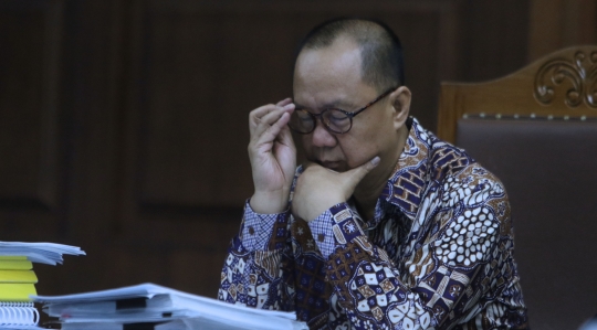 Ekspresi mantan kepala BPPN saat jalani sidang lanjutan BLBI