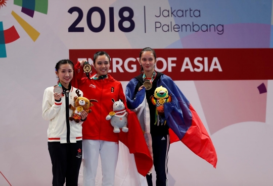 Gaya atlet wushu Lindswell gigit emas kedua untuk Indonesia