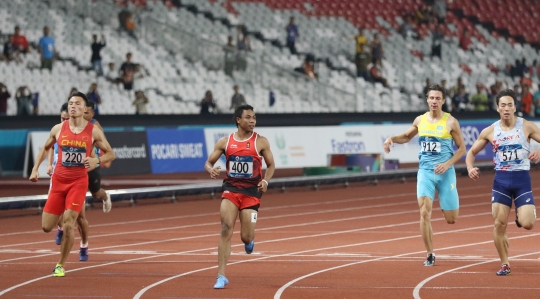 Aksi Zohri saat masuk semifinal di kualifikasi lari 100 meter