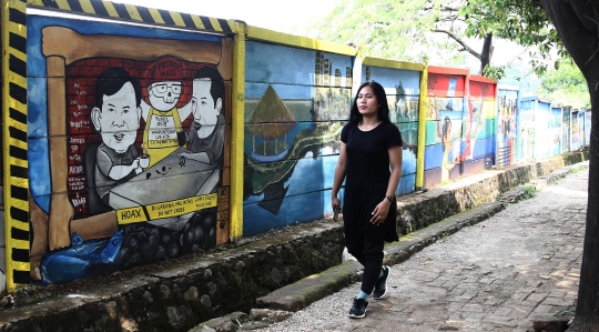 Serukan Pemilu Damai, Warga Depok Buat Mural Jokowi dan Prabowo Ngopi Bareng