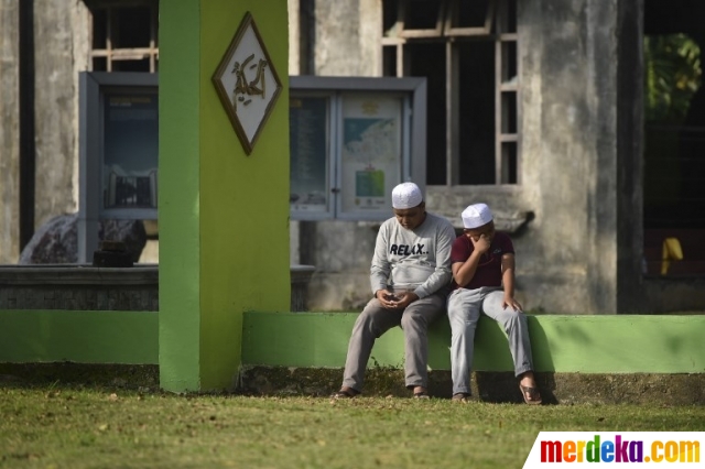  Foto  Berziarah di Peringatan 14 Tahun Tsunami Aceh 