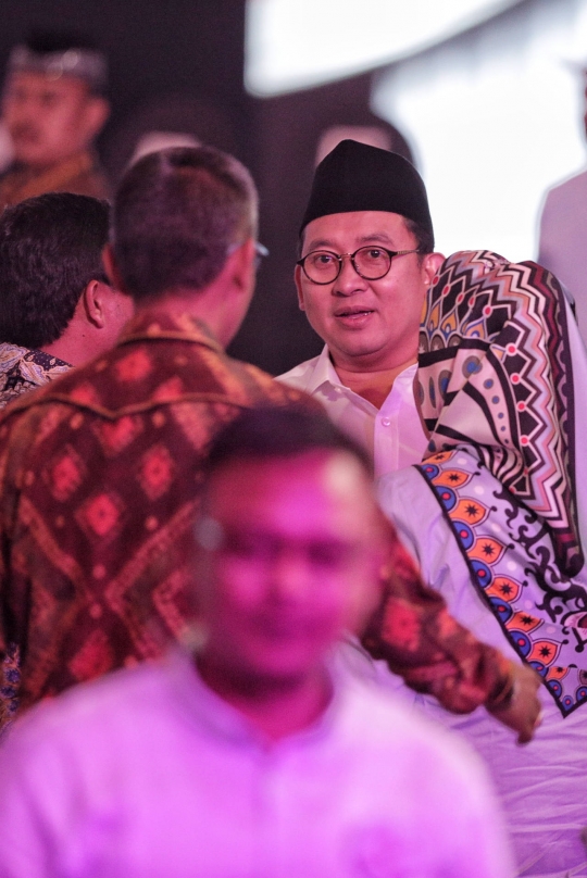 Suasana Dua Pendukung Capres dan Cawapres 01 dan 02 Jelang Debat Pertama