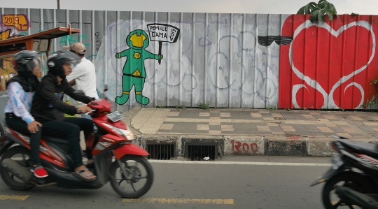 Warga Depok Serukan Pemilu Damai Melalui Mural