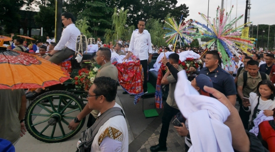 Tinggalkan GBK, Jokowi-Ma'ruf ke Lokasi Debat Naik Kereta Kencana