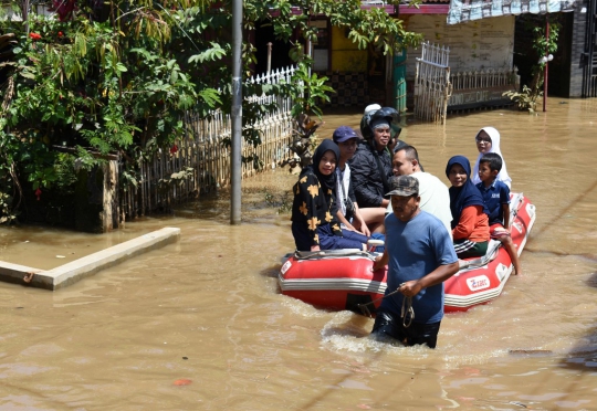 Banjir Tak Halangi Warga Bandung Gunakan Hak Pilih