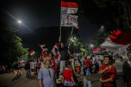 Pendukung Jokowi-Ma'ruf Pawai di Tugu Proklamasi