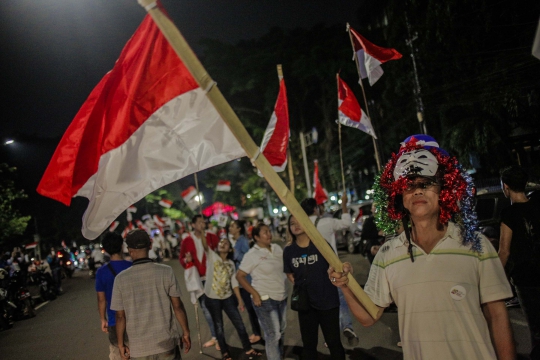 Pendukung Jokowi-Ma'ruf Pawai di Tugu Proklamasi