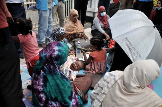 Puluhan Imigran Terlantar di Trotoar Jalan Kebon Sirih