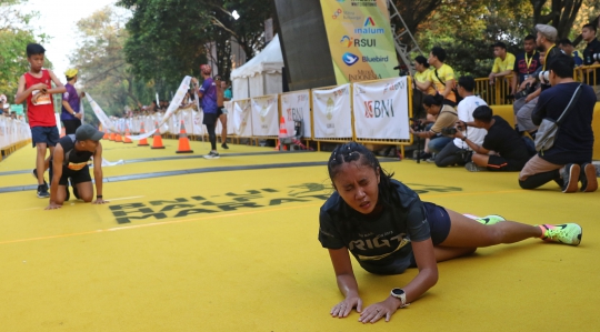 Keseruan Ribuan Peserta Ikuti UI Half Marathon 2019