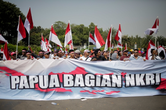 Aksi Demo Menyerukan Papua Tetap NKRI di Istana Merdeka