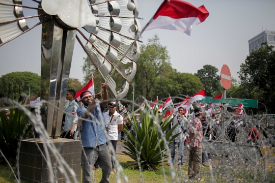 Aksi Demo Menyerukan Papua Tetap NKRI di Istana Merdeka