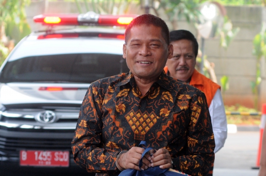 Diperiksa KPK, Terpidana Mantan Panitera Pengganti PN Jakut Umbar Senyum