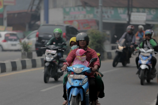 Kondisi Kabut Asap Pekat Selimuti Pekanbaru