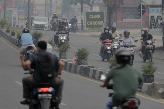 Kondisi Kabut Asap Pekat Selimuti Pekanbaru