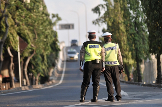 Penindakan Pelanggar Sistem Ganjil Genap di Pintu Keluar Tol