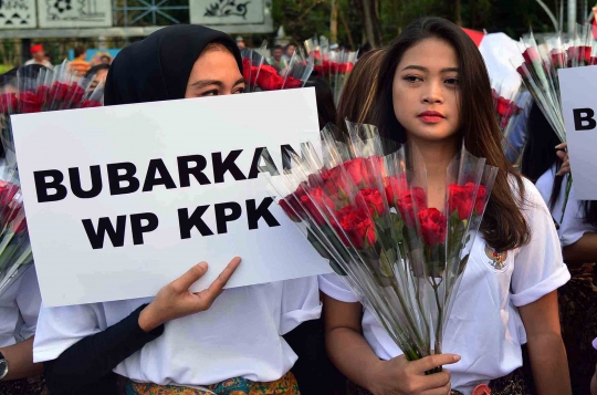 Massa Dukung Jokowi Setujui Revisi UU KPK