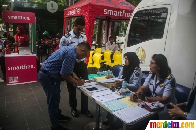 Foto : Imigrasi Jakarta Pusat Gelar Layanan Paspor Keliling | Merdeka.com