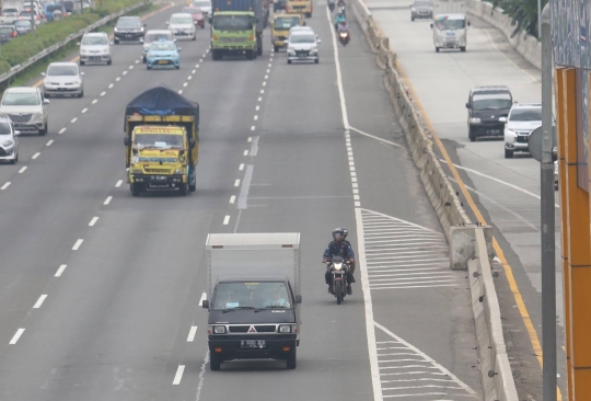 Banjir, Sepeda Motor Diperbolehkan Lewat Tol Karang Tengah