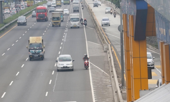 Banjir, Sepeda Motor Diperbolehkan Lewat Tol Karang Tengah