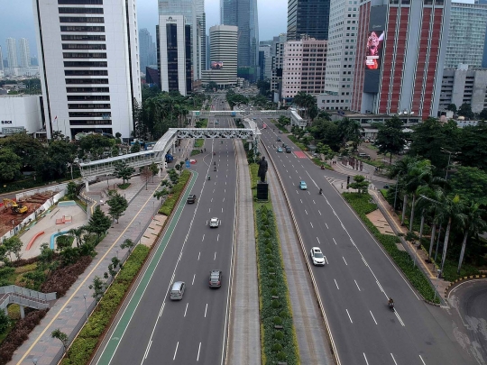 Pemandangan Jalanan Ibu Kota yang Lengang Akibat Corona